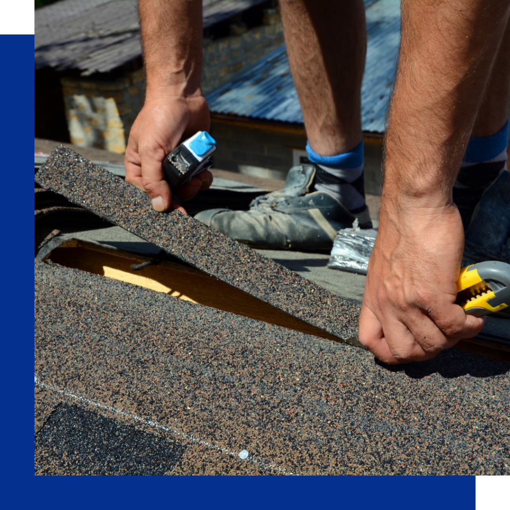roofer laying shingles down